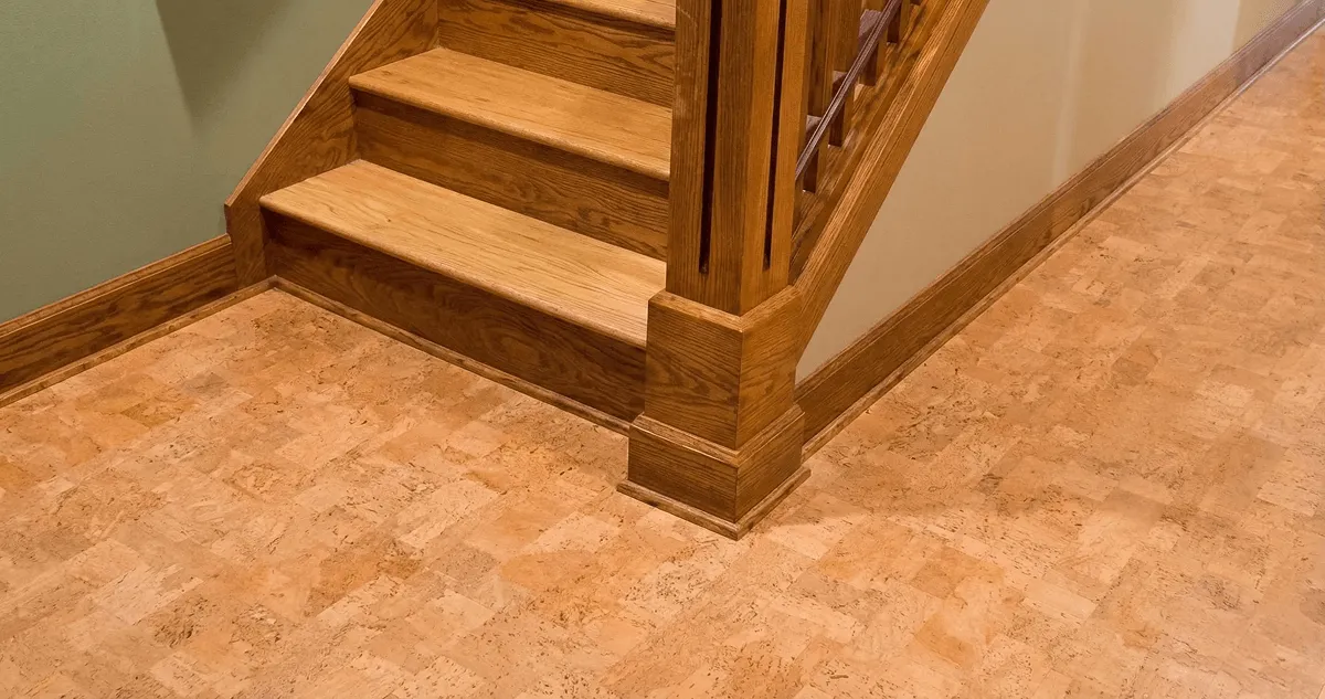 End of a staircase with cork flooring in Saint Louis, MO