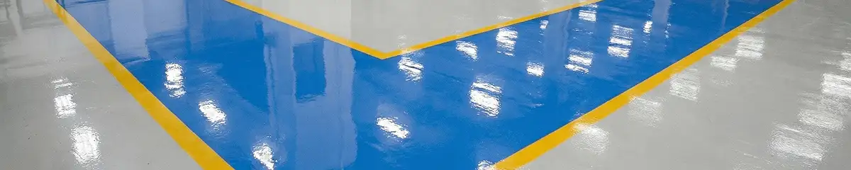 A factory floor professionally covered and marked with epoxy flooring in Saint Louis, MO