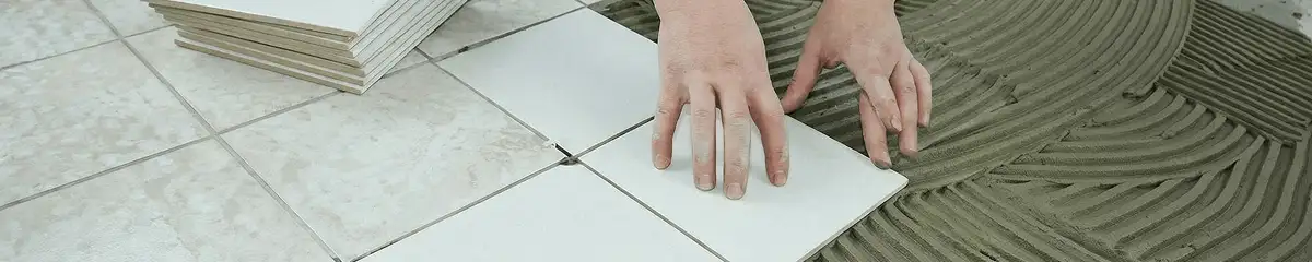 Professional installing white tile floors in Saint Louis, MO