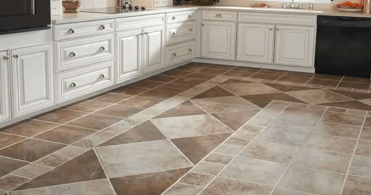 Kitchen with white cabinets and a professionally installed tile floor in Saint Louis, MO