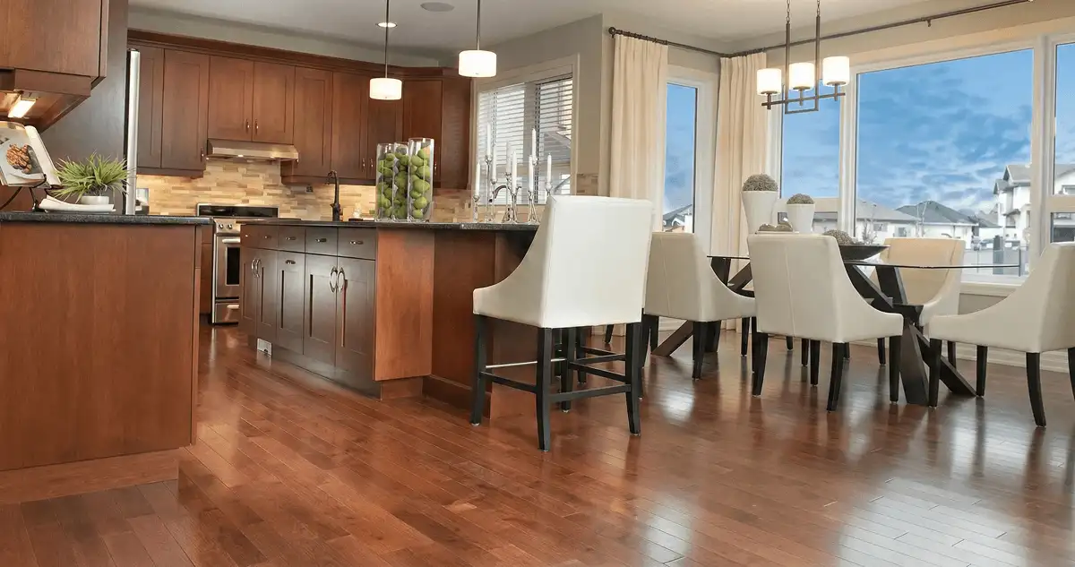 A modern kitchen with professionally installed wood flooring in Saint Louis, MO